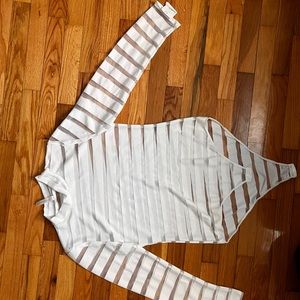 White and clear body suit